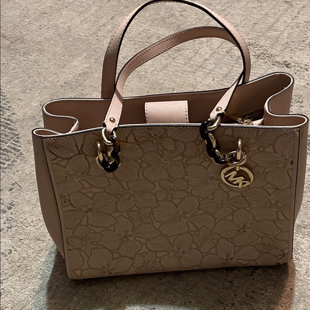 Michael Kors Sofia large leather tote bag with embroidered floral pattern.